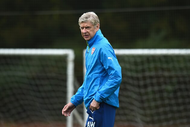 ST ALBANS, ENGLAND - AUGUST 26:  Arsenal manager Arsene Wenger during a training session at London Colney on August 26, 2014 in St Albans, England.  (Photo by Shaun Botterill/Getty Images)