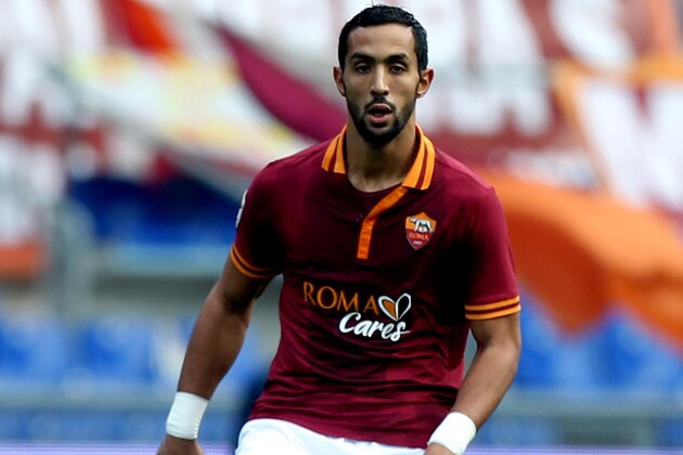 ROME, ITALY - JANUARY 12:  Mehdi Benatia of AS Roma in action during the Serie A match between AS Roma and Genoa CFC at Stadio Olimpico on January 12, 2014 in Rome, Italy.  (Photo by Paolo Bruno/Getty Images)