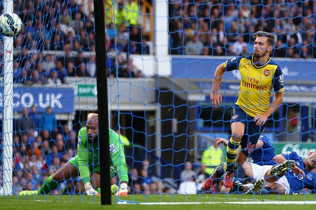 LIVERPOOL, ENGLAND - AUGUST 23:  Aaron Ramsey of Arsenal scores his team's first goal during the Barclays Premier League match between Everton and Arsenal at Goodison Park on August 23, 2014 in Liverpool, England.  (Photo by Clive Brunskill/Getty Images)