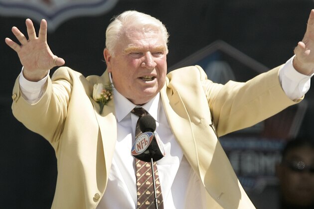 John Madden speaks during the enshrinement ceremony at the Pro Football Hall of Fame, Saturday, August 5, 2006, in Canton, Ohio. Madden was inducted in the Class of 2006. (AP Photo/Tony Dejak)