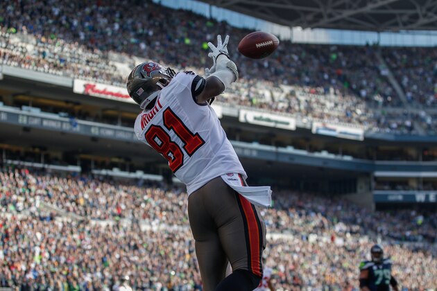 SEATTLE, WA - NOVEMBER 03:  Wide receiver Timothy Wright #81 of the Tampa Bay Buccaneers makes a touchdown catch in the first half against the Seattle Seahawks at CenturyLink Field on November 3, 2013 in Seattle, Washington.  (Photo by Otto Greule Jr/Getty Images)