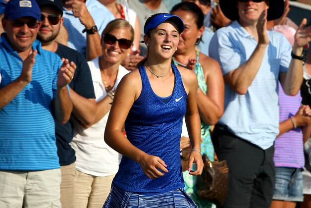 NEW YORK, NY - AUGUST 26:  Catherine Bellis of the United States reacts after defeating Dominika Cibulkova of Slovakia during their women's singles first round match on Day Two of the 2014 US Open at the USTA Billie Jean King National Tennis Center on August 26, 2014  in the Flushing neighborhood of the Queens borough of New York City.  (Photo by Streeter Lecka/Getty Images)