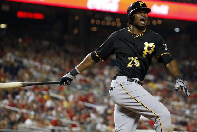 Pittsburgh Pirates' Gregory Polanco reacts as he fouls a ball off his foot during the 11th inning of a baseball game against the Washington Nationals at Nationals Park, Sunday, Aug. 17, 2014, in Washington. The Nationals won 6-5 in 11 innings. (AP Photo/Alex Brandon)