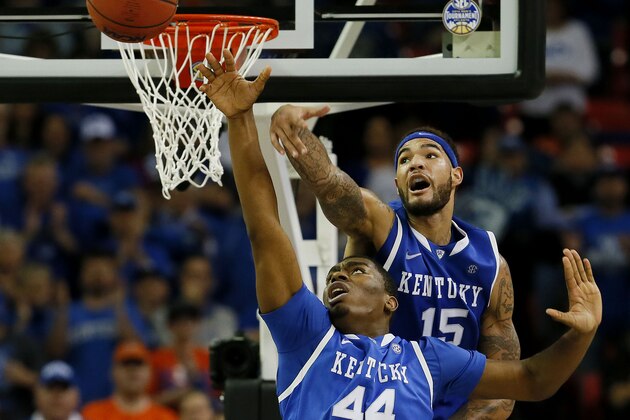 ATLANTA, GA - MARCH 16:  Willie Cauley-Stein #15 and Dakari Johnson #44 of the Kentucky Wildcats block a shot by Casey Prather #24 of the Florida Gators in the second half during the Championship game of the 2014 Men's SEC Basketball Tournament at Georgia Dome on March 16, 2014 in Atlanta, Georgia.  (Photo by Kevin C. Cox/Getty Images)