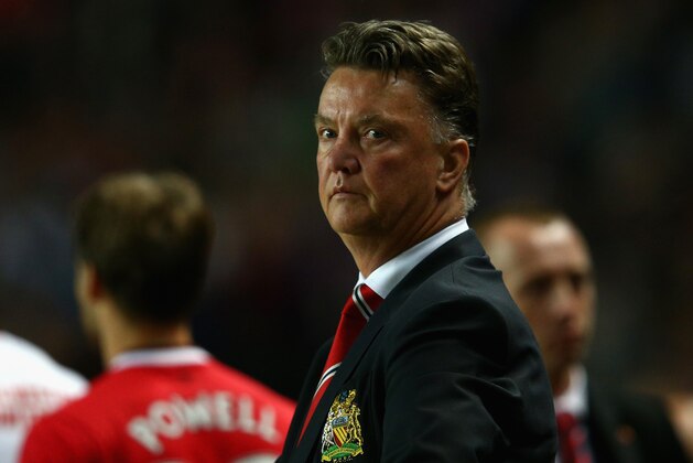 MILTON KEYNES, ENGLAND - AUGUST 26:  Manager Louis van Gaal of Manchester United looks on during the Capital One Cup second round match between MK Dons and Manchester United at Stadium mk on August 26, 2014 in Milton Keynes, England.  (Photo by Clive Mason/Getty Images)