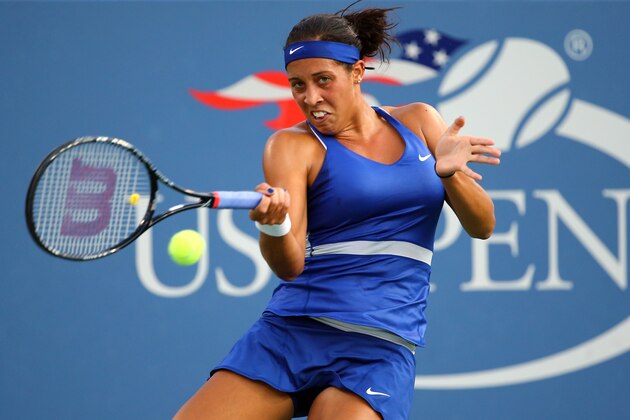 NEW YORK, NY - AUGUST 26:  Madison Keys of the United States returns a shot against Jarmila Gajdosova of Australia during their women's singles first round match on Day Two of the 2014 US Open at the USTA Billie Jean King National Tennis Center on August 26, 2014  in the Flushing neighborhood of the Queens borough of New York City.  (Photo by Al Bello/Getty Images)