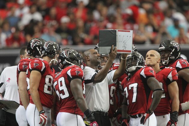 Atlanta Falcons special teams coach Keith Armstrong speaks to team members against the Cincinnati Bengals during an NFL football game at the Georgia Dome in Atlanta Sunday, Oct. 24, 2010. (AP Photo/John Bazemore)