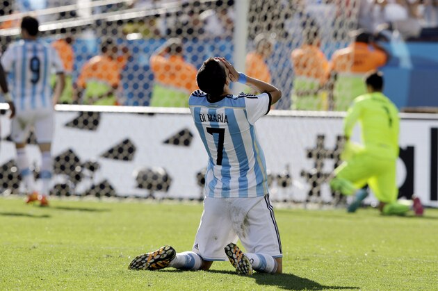 Argentina's Angel di Maria reacts after missing a chance to score during the World Cup round of 16 soccer match between Argentina and Switzerland at the Itaquerao Stadium in Sao Paulo, Brazil, Tuesday, July 1, 2014. Argentina beat Switzerland 1-0 after extra time.(AP Photo/Kirsty Wigglesworth)