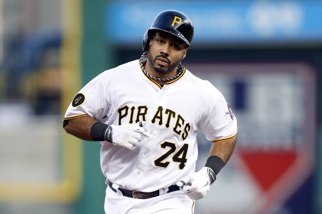 Aug 25, 2014; Pittsburgh, PA, USA; Pittsburgh Pirates first baseman Pedro Alvarez (24) rounds the bases after hitting a solo home run against the St. Louis Cardinals during the second inning at PNC Park. Mandatory Credit: Charles LeClaire-USA TODAY Sports