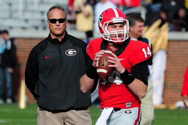 ATLANTA, GA - NOVEMBER 30: Hudson Mason #14 of the Georgia Bulldogs warms up next to head coach Mark Richt before the game against the Georgia Tech Yellow Jackets at Bobby Dodd Stadium on November 30, 2013 in Atlanta, Georgia. (Photo by Scott Cunningham/Getty Images)