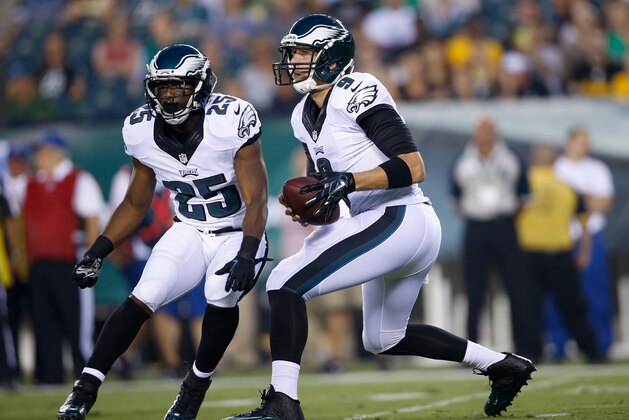 Philadelphia Eagles' Nick Foles, right, and LeSean McCoy run a play during the first half of an NFL preseason football game against the Pittsburgh Steelers, Thursday, Aug. 21, 2014, in Philadelphia. (AP Photo/Michael Perez)