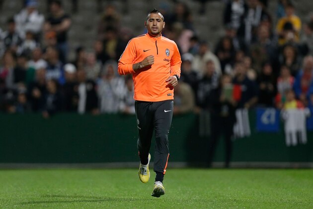 SYDNEY, AUSTRALIA - AUGUST 09:  Arturo Vidal runs during a Juventus training session at WIN Jubilee Stadium on August 9, 2014 in Sydney, Australia.  (Photo by Mark Metcalfe/Getty Images)