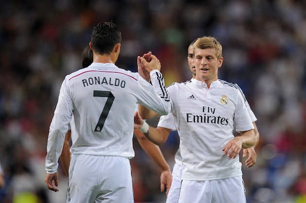 MADRID, SPAIN - AUGUST 25:  Cristiano Ronaldo of Real Madrid celebrates with Toni Kroos after scoring Real's 2nd goal during the La liga match between Real Madrid CF and Cordoba CF at Estadio Santiago Bernabeu on August 25, 2014 in Madrid, Spain.  (Photo by Denis Doyle/Getty Images)