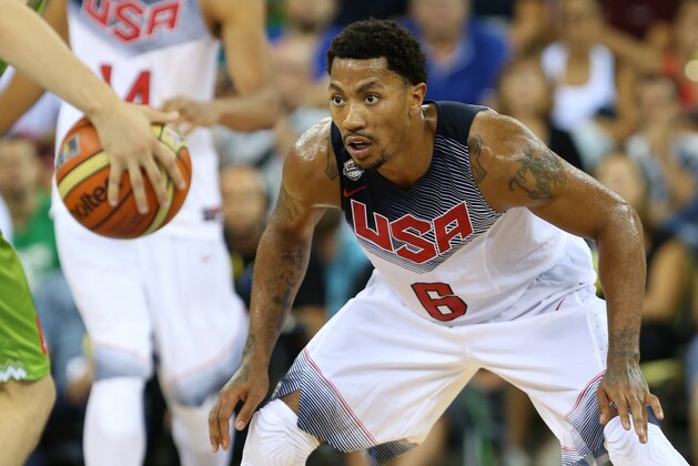 LAS PALMAS, GRAN CANARIA, SPAIN - AUGUST 26: Derrick Rose #6 of the USA Men's National Team defends the ball against the Slovenia National Team on August 26, 2014 at Gran Canaria Arena in Las Palmas, Gran Canaria, Spain. NOTE TO USER: User expressly acknowledges and agrees that, by downloading and or using this photograph, user is consenting to the terms and conditions of the Getty Images License Agreement. Mandatory Copyright Notice: Copyright 2014 NBAE (Photo by Joe Murphy/NBAE via Getty Images) LAS PALMAS, GRAN CANARIA, SPAIN - AUGUST 26: Derrick Rose #6 of the USA Men's National Team defends the ball against the Slovenia National Team on August 26, 2014 at Gran Canaria Arena in Las Palmas, Gran Canaria, Spain. NOTE TO USER: User expressly acknowledges and agrees that, by downloading and or using this photograph, user is consenting to the terms and conditions of the Getty Images License Agreement. Mandatory Copyright Notice: Copyright 2014 NBAE (Photo by Joe Murphy/NBAE via Getty Images)