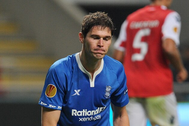 Birmingham's Nikola Zigic, from Serbia, reacts after missing a shot against Sporting Braga during their Europa League group H soccer match at the Municipal Stadium, Braga, Portugal, Wednesday Nov. 30, 2011. (AP Photo/Paulo Duarte)