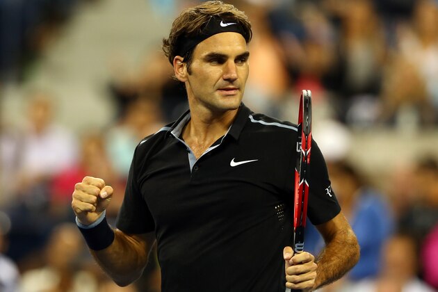 NEW YORK, NY - AUGUST 26:  Roger Federer of Switzerland reacts against Marinko Matosevic of Australia during their men's singles first round match on Day Two of the 2014 US Open at the USTA Billie Jean King National Tennis Center on August 26, 2014  in the Flushing neighborhood of the Queens borough of New York City.  (Photo by Elsa/Getty Images)