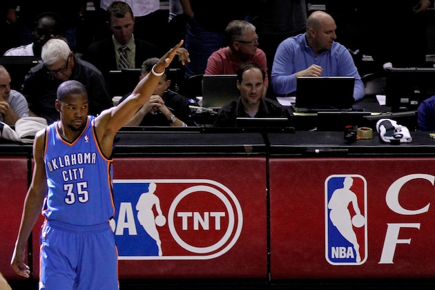 SAN ANTONIO, TX - MAY 21:  Kevin Durant #35 of the Oklahoma City Thunder points before taking on the San Antonio Spurs in Game Two of the Western Conference Finals during the 2014 NBA Playoffs at AT&T Center on May 21, 2014 in San Antonio, Texas. NOTE TO USER: User expressly acknowledges and agrees that, by downloading and or using this photograph, User is consenting to the terms and conditions of the Getty Images License Agreement.  (Photo by Chris Covatta/Getty Images)