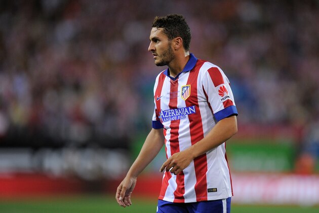 MADRID, SPAIN - AUGUST 22:  Koke of Club Atletico de Madrid looks on during the Supercopa, second leg match between Club Atletico de Madrid and Real Madrid at Vicente Caldron stadium on August 22, 2014 in Madrid, Spain.  (Photo by Denis Doyle/Getty Images)