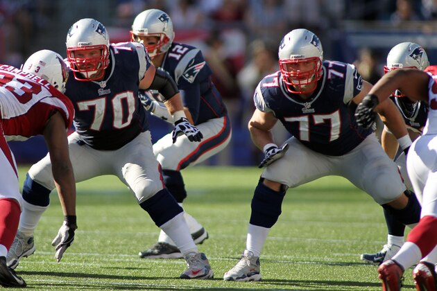 New England Patriots guard Logan Mankins (70) and tackle Nate Solder (77) block during the fourth quarter against the Arizona Cardinals at Gillette Stadium, Sunday, September 16, 2012 in Foxborough, Mass. (AP Photo/Stew Milne)
