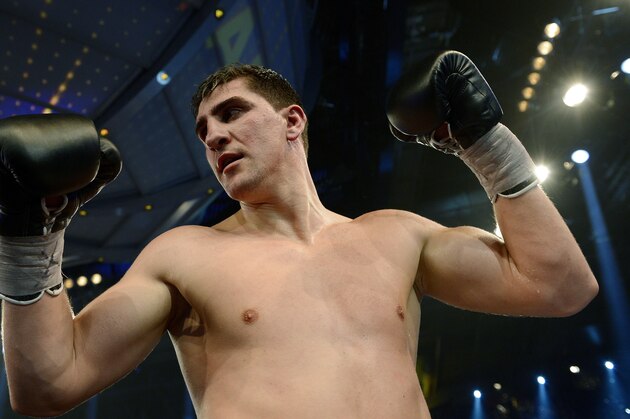 Champion Marco Huck of Germany celebrates after defending his WBO cruiserweight title against challenger Firat Arslan in Stuttgart, Germany, Saturday, Jan. 25, 2014. Huck stopped compatriot Arslan in the sixth round of their rematch to successfully retain his WBO belt for the 12th time. (AP Photo/Daniel Kopatsch) Champion Marco Huck of Germany celebrates after defending his WBO cruiserweight title against challenger Firat Arslan in Stuttgart, Germany, Saturday, Jan. 25, 2014. Huck stopped compatriot Arslan in the sixth round of their rematch to successfully retain his WBO belt for the 12th time. (AP Photo/Daniel Kopatsch)