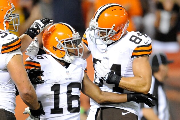 CLEVELAND, OH - AUGUST 23:  Andrew Hawkins #16 celebrates his touchdown with Alex Mack #55 and Jordan Cameron #84 of the Cleveland Browns during the second quarter against the St. Louis Rams at FirstEnergy Stadium on August 23, 2014 in Cleveland, Ohio.  (Photo by Joe Sargent/Getty Images)