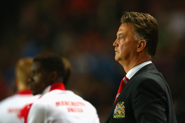 MILTON KEYNES, ENGLAND - AUGUST 26:  Manager Louis van Gaal of Manchester United looks dejected after the Capital One Cup Second Round match between MK Dons and Manchester United at Stadium mk on August 26, 2014 in Milton Keynes, England.  (Photo by Clive Mason/Getty Images)