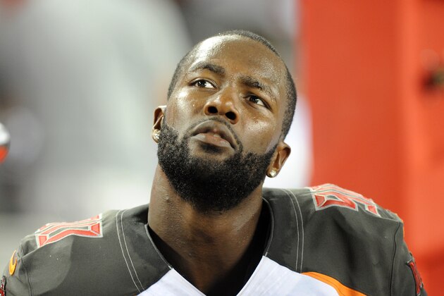 TAMPA, FL - AUGUST 16:  Defensive end Michael Johnson #90 of the Tampa Bay Buccaneers at Raymond James Stadium during a preseason game on August 16, 2014 in Tampa, Florida. (Photo by Cliff McBride/Getty Images)