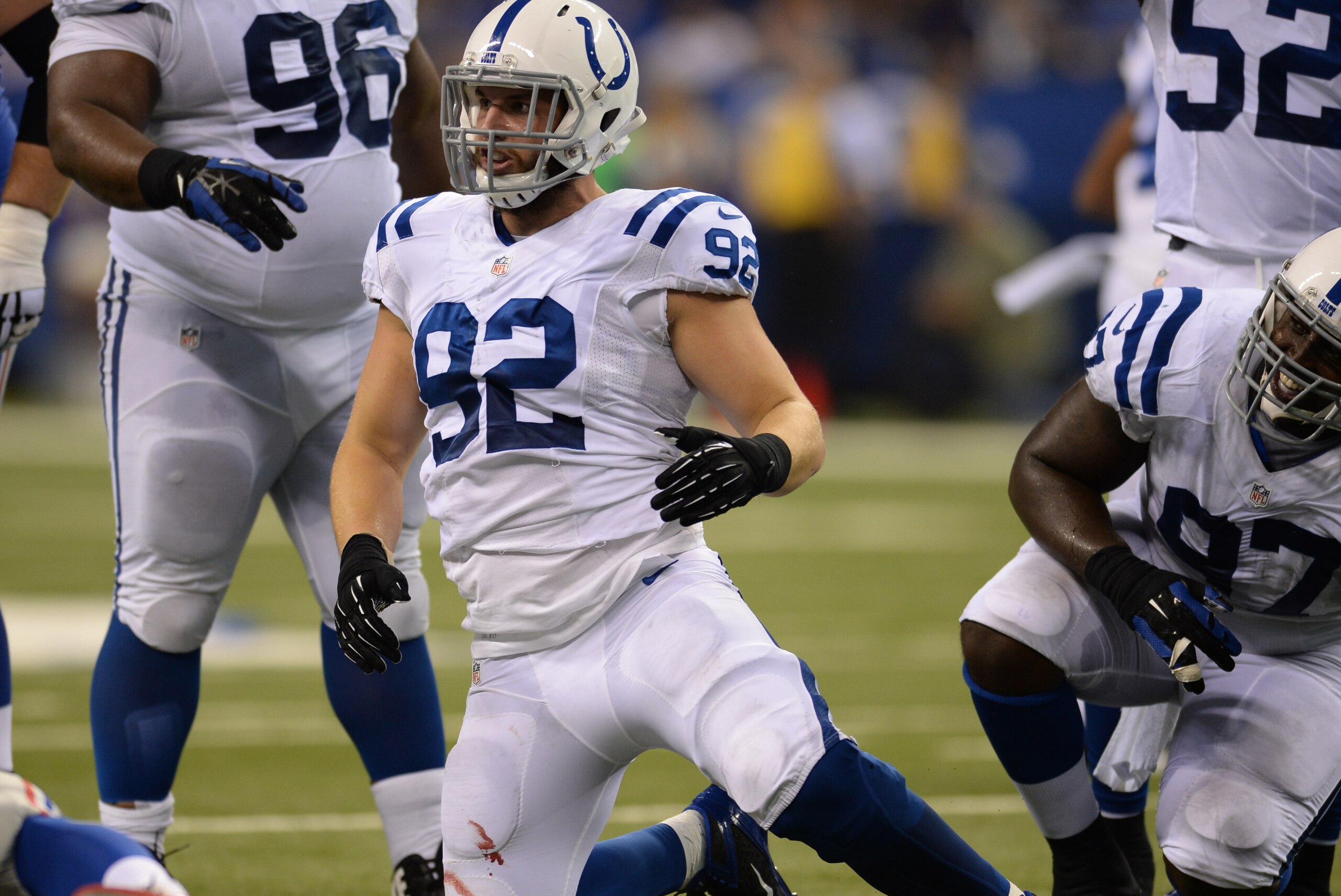 Indianapolis Colts' Bjoern Werner (92) makes a play during the first half of an NFL preseason football game against the New York Giants Saturday, Aug. 16, 2014, in Indianapolis. (AP Photo/Chris Howell)