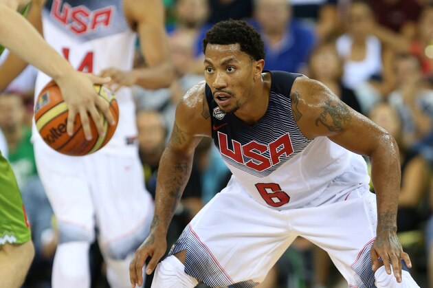 LAS PALMAS, GRAN CANARIA, SPAIN - AUGUST 26: Derrick Rose #6 of the USA Men's National Team defends the ball against the Slovenia National Team on August 26, 2014 at Gran Canaria Arena in Las Palmas, Gran Canaria, Spain. NOTE TO USER: User expressly acknowledges and agrees that, by downloading and or using this photograph, user is consenting to the terms and conditions of the Getty Images License Agreement. Mandatory Copyright Notice: Copyright 2014 NBAE (Photo by Joe Murphy/NBAE via Getty Images)