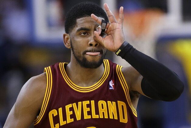 Cleveland Cavaliers guard Kyrie Irving celebrates after making a three-point basket against the Golden State Warriors during the second half of an NBA basketball game on Friday, March 14, 2014, in Oakland, Calif. Cleveland won 103-94. (AP Photo/Marcio Jose Sanchez) Cleveland Cavaliers guard Kyrie Irving celebrates after making a three-point basket against the Golden State Warriors during the second half of an NBA basketball game on Friday, March 14, 2014, in Oakland, Calif. Cleveland won 103-94. (AP Photo/Marcio Jose Sanchez)