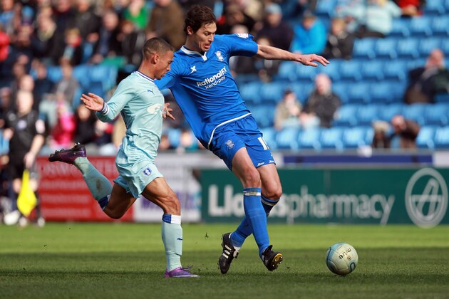 COVENTRY, ENGLAND - MARCH 10: Nikola Zigic of Birmingham City holds off Jordan Clarke of Coventry during the npower Championship match between Coventry City and Birmingham City at The Ricoh Arena on March 10, 2012 in Coventry, England. (Photo by Jan Kruger/Getty Images) COVENTRY, ENGLAND - MARCH 10: Nikola Zigic of Birmingham City holds off Jordan Clarke of Coventry during the npower Championship match between Coventry City and Birmingham City at The Ricoh Arena on March 10, 2012 in Coventry, England. (Photo by Jan Kruger/Getty Images)