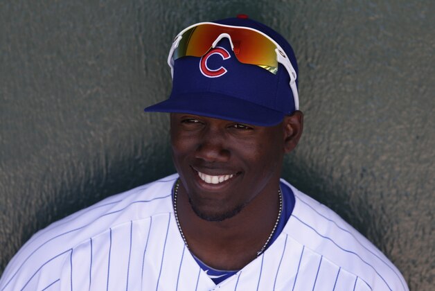 Chicago Cubs right fielder Jorge Soler plays during a spring training baseball game against the Colorado Rockies in Mesa, Ariz. Wednesday, March 13, 2013. (AP Photo/Chris Carlson)