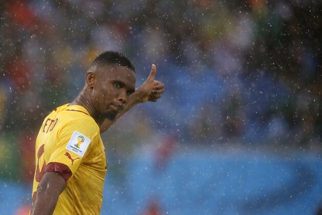 Cameroon's Samuel Eto’o gestures during the group A World Cup soccer match between Mexico and Cameroon in the Arena das Dunas in Natal, Brazil, Friday, June 13, 2014.  (AP Photo/Sergei Grits)