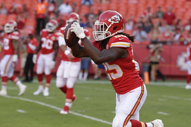 Kansas City Chiefs running back Jamaal Charles (25) makes a catch before an NFL preseason football game against the Minnesota Vikings in Kansas City, Mo., Saturday, Aug. 23, 2014. (AP Photo/Charlie Riedel)