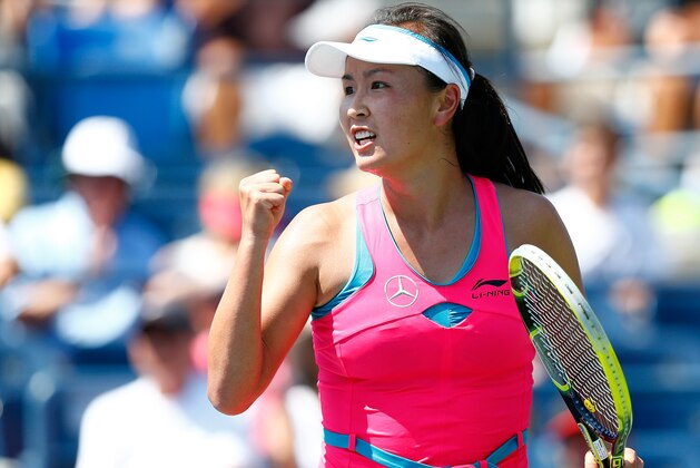 NEW YORK, NY - AUGUST 27:  Shuai Peng of China reacts after defeating Agnieszka Radwanska of Poland on Day Three of the 2014 US Open at the USTA Billie Jean King National Tennis Center on August 27, 2014  in the Flushing neighborhood of the Queens borough of New York City.  (Photo by Julian Finney/Getty Images)