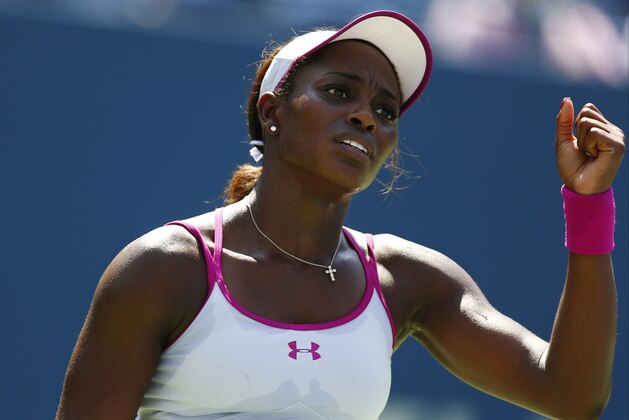 Sloane Stephens, of the United States, reacts after a point against Johanna Larsson, of Sweden, during the second round of the 2014 U.S. Open tennis tournament, Wednesday, Aug. 27, 2014, in New York. (AP Photo/Matt Rourke)
