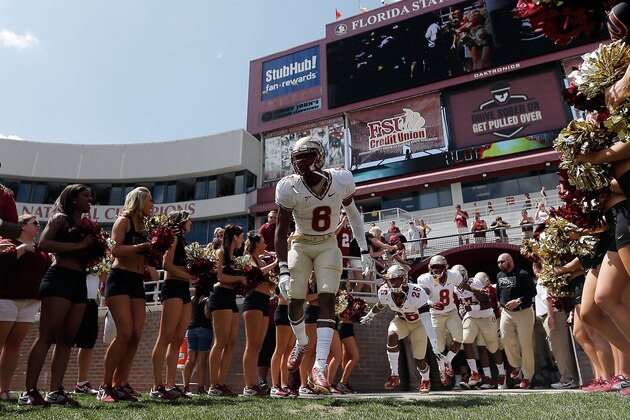 TALLAHASSEE, FL - APRIL 12:  Members of the Florida State Seminoles take the field for the Garnet and Gold spring game at Doak Campbell Stadium on April 12, 2014 in Tallahassee, Florida.  (Photo by Stacy Revere/Getty Images)