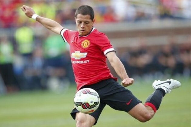 IMAGE DISTRIBUTED FOR GUINNESS INTERNATIONAL CHAMPIONS CUP - Manchester United forward Javier Hernandez (14) strikes the ball in the second half against the Real Madrid at Guinness International Champions Cup, on Saturday, August 2, 2014 in Ann Arbor, Michigan. (Rick Osentoski/AP Images for Guinness International Champions Cup)