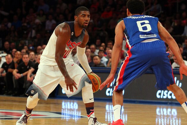 Aug 20, 2014; New York, NY, USA; United States guard Kyrie Irving (10) controls the ball against Dominican Republic guard Juan Coronado (6) during the second quarter of a game at Madison Square Garden. Mandatory Credit: Brad Penner-USA TODAY Sports
