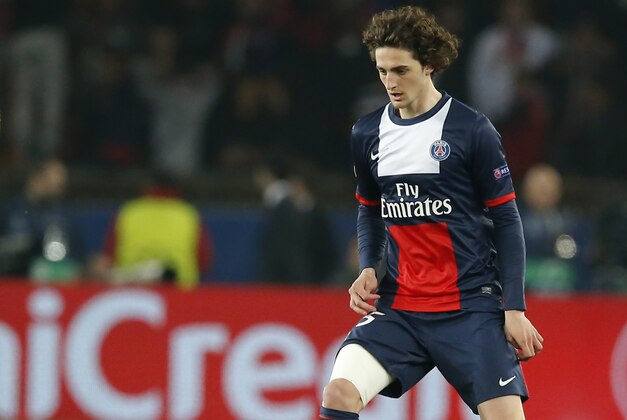 Paris Saint Germain's Adrien Rabiot, controls the ball during a Champions League last 16 second leg soccer match between Paris Saint Germain against Bayer Leverkusen at Parc des Princes stadium in Paris, Wednesday, March 12, 2014. (AP Photo/Michel Euler)