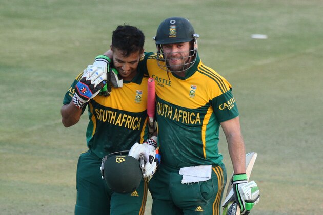 South African batsman AB de Villiers, right, and JP Duminy, smile while walking off the pitch after South Africa won by 7 wickets in the cricket One Day International match against Australia in Harare, Zimbabwe, Wednesday, Aug. 27, 2014. The two teams are in Zimbabwe for a triangular ODI series with Zimbabwe. (AP Photo/Tsvangirayi Mukwazhi) South African batsman AB de Villiers, right, and JP Duminy, smile while walking off the pitch after South Africa won by 7 wickets in the cricket One Day International match against Australia in Harare, Zimbabwe, Wednesday, Aug. 27, 2014. The two teams are in Zimbabwe for a triangular ODI series with Zimbabwe. (AP Photo/Tsvangirayi Mukwazhi)