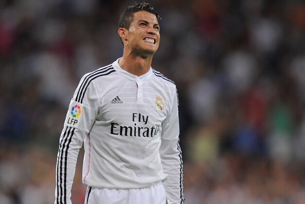 MADRID, SPAIN - AUGUST 25:  Cristiano Ronaldo of Real Madrid celebrates after scoring Real's 2nd goal during the La liga match between Real Madrid CF and Cordoba CF at Estadio Santiago Bernabeu on August 25, 2014 in Madrid, Spain.  (Photo by Denis Doyle/Getty Images)