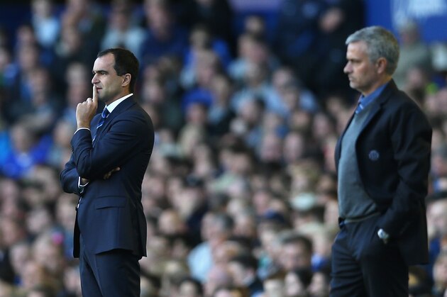 LIVERPOOL, ENGLAND - SEPTEMBER 14:  Everton Manager Roberto Martinez looks on with Chelsea Manager Jose Mourinho (r) during the Barclays Premier League match between Everton and Chelsea at Goodison Park on September 14, 2013 in Liverpool, England.  (Photo by Clive Brunskill/Getty Images)