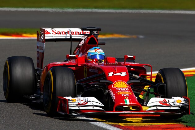 SPA, BELGIUM - AUGUST 24:  Fernando Alonso of Spain and Ferrari drives during the Belgian Grand Prix at Circuit de Spa-Francorchamps on August 24, 2014 in Spa, Belgium.  (Photo by Clive Mason/Getty Images)