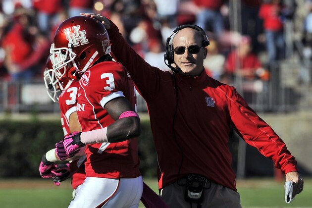 Houston coach Tony Levine, right, congratulates Deontay Greenberry (3) on a touchdown catch against UTEP during the first half of an NCAA college football game Saturday, Oct. 27, 2012, in Houston. (AP Photo/Pat Sullivan)