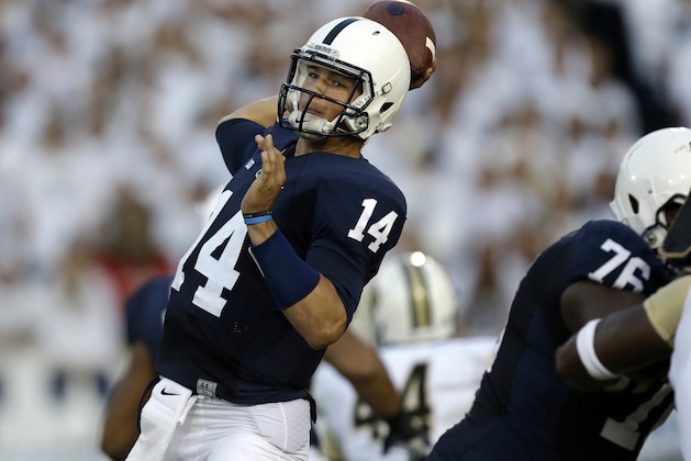 FILE - In this Sept. 14, 2013 file photo, Penn State quarterback Christian Hackenberg throws a during the first quarter of an NCAA college football game against Central Florida in State College, Pa. Hackenberg is working this week to bounce back from his first collegiate loss, but through three weeks Nittany Lions fans have to be impressed with this freshman. (AP Photo/Gene J. Puskar, File)