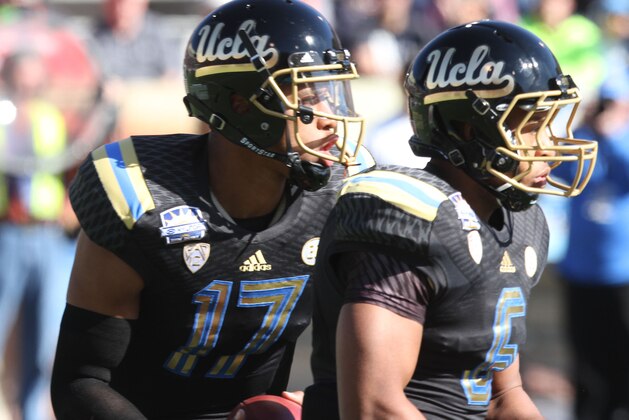 UCLA quarterback Brett Hundley scrambles against Virginia Tech during the Sun Bowl NCAA college football game Tuesday Dec. 31, 2013. (AP Photo/Victor Calzada)