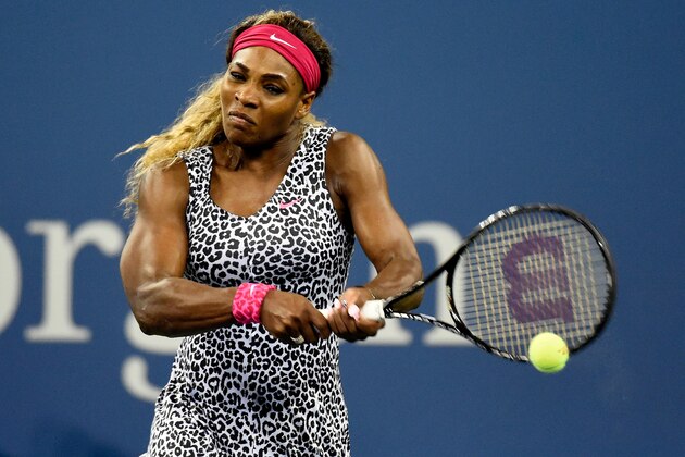NEW YORK, NY - AUGUST 26:  Serena Williams of the United States returns a shot to Taylor Townsend of the United States during their women's singles first round match on Day Two of the 2014 US Open at the USTA Billie Jean King National Tennis Center on August 26, 2014  in the Flushing neighborhood of the Queens borough of New York City.  (Photo by Alex Goodlett/Getty Images)