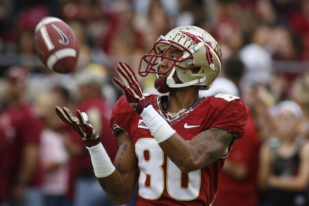 Florida State wide receiver Rashad Greene (80) catches a pass before the start of an NCAA college football game against Syracuse on Saturday, Nov. 16, 2013 in Tallahassee, Fla. Florida State beat Syracuse 59-3. (AP Photo/Phil Sears)