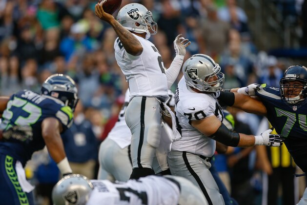 SEATTLE, WA - AUGUST 29: Quarterback Terrelle Pryor #2 of the Oakland Raiders passes against the Seattle Seahawks at CenturyLink Field on August 29, 2013 in Seattle, Washington. (Photo by Otto Greule Jr/Getty Images)